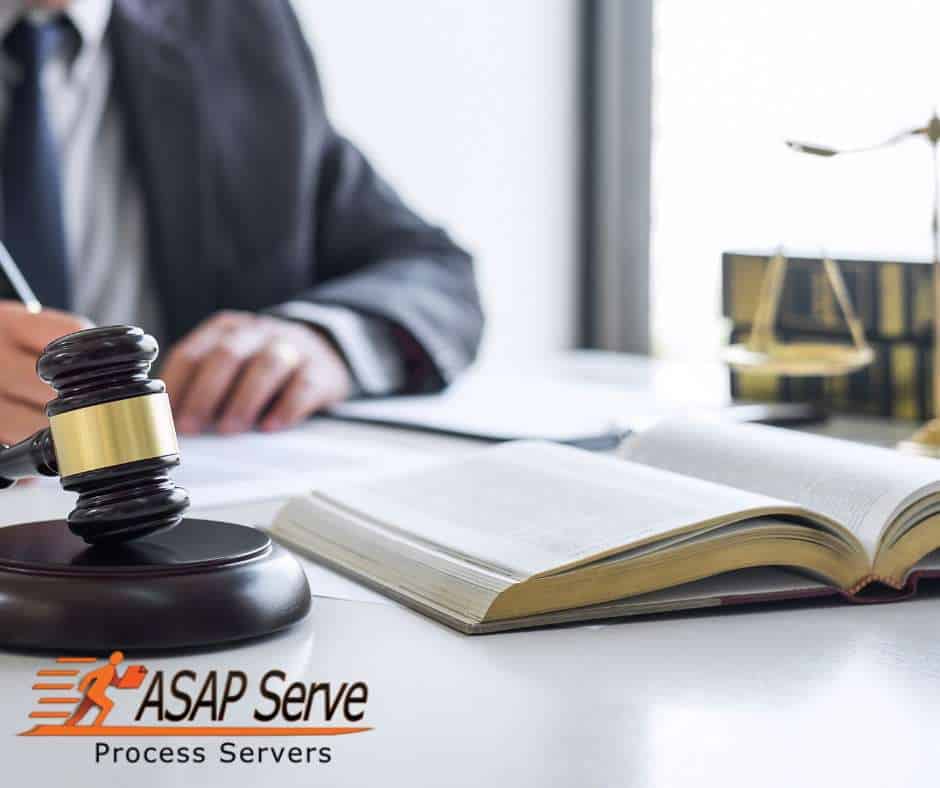 Legal professional handling case details while discussing the consequences of avoiding a process server